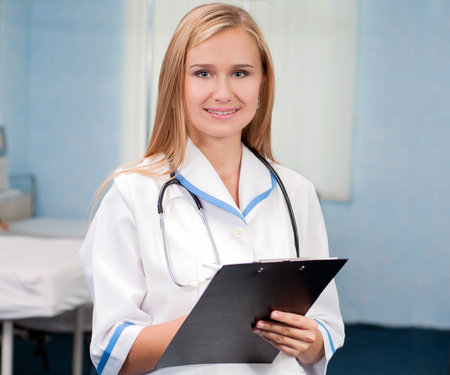 Portrait of a smiling female doctor in medical center