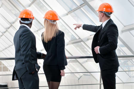A group of young engineers at the present site of the business discussionの写真素材