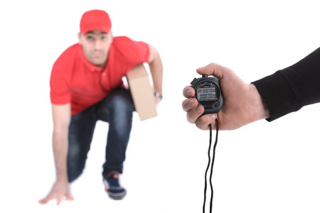 Delivery boy in a rush delivering a package isolated against white background