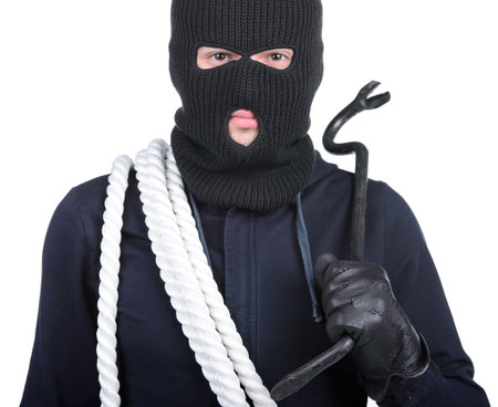 Male offender from Balaklava in the head with a rope and scrap  Isolated on white backgroundの写真素材