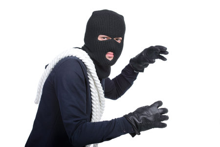 Male offender from Balaklava in the head with a rope  Isolated on white backgroundの写真素材