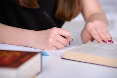 Portrait of a young girl on the student classroomの写真素材