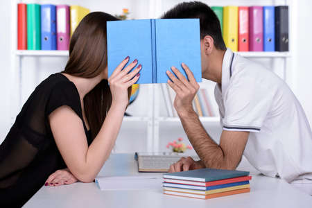 Group young students while studying in classroomの写真素材