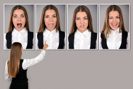 ÐÐ¸Ð±ÑÑ ÐµÐ¼Ð¾ÑÑÑ. ÐÑÐ·Ð½ÐµÑ Ð¶ÑÐ½ÐºÐ° Ð´Ð¸Ð²Ð»ÑÑÐ¸ÑÑ Ð½Ð° Ð¿Ð¾ÑÑÑÐµÑÐ¸ Ð· ÑÑÐ·Ð½Ñ ÐµÐ¼Ð¾ÑÑÑ.の写真素材