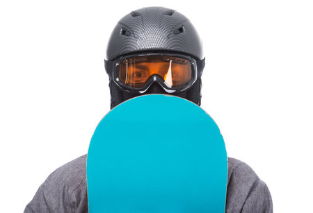 Portrait of young man in sportswear with snowboard isolated on a white .の写真素材