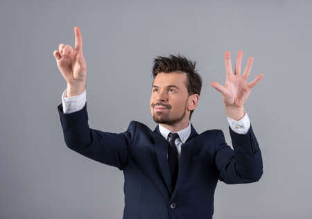 Innovation concept. Man is presenting innovation of his own hands.の写真素材