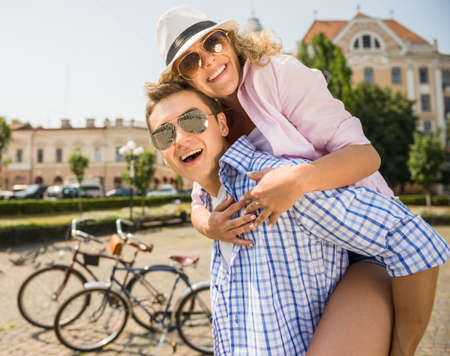 A picture of young couple having fun in the city.の写真素材