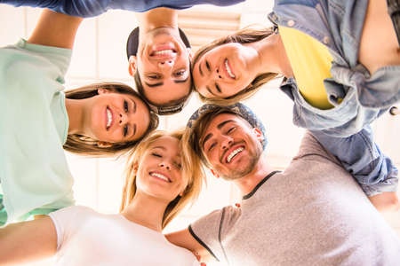 Group of happy friends smiling are looking at the camera.の写真素材