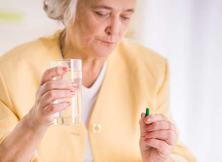Portrait of Senior business woman working in the officeの写真素材