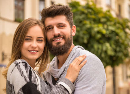 Young happy couple on a walk in the cityの写真素材