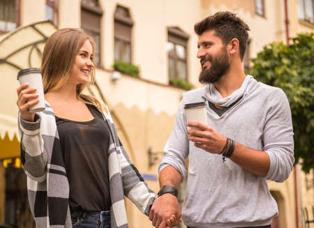 Young happy couple on a walk in the cityの写真素材