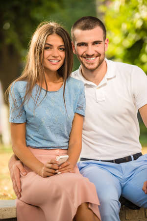 Loving young couple on a date in the parkの写真素材
