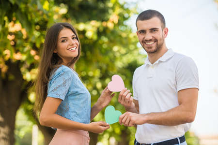 Loving young couple on a date in the parkの写真素材