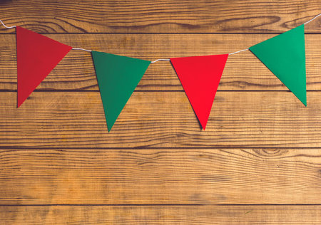 Merry Christmas! Accessories for celebrating Christmas on a wooden tableの写真素材