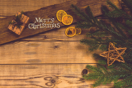 Merry Christmas! Accessories for celebrating Christmas on a wooden table