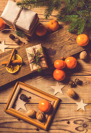 Merry Christmas! Accessories for celebrating Christmas on a wooden tableの写真素材