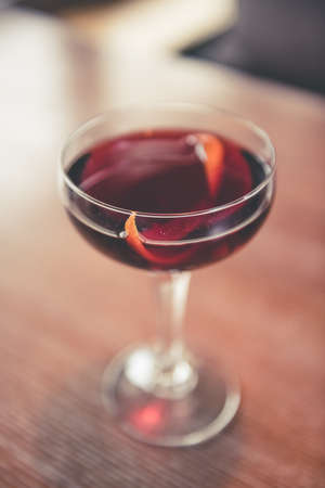 Glass of tasty beverage with spices on table, for your leisureの写真素材