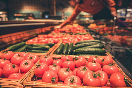 At the supermarket. Fresh vegetables are waiting for customersの写真素材