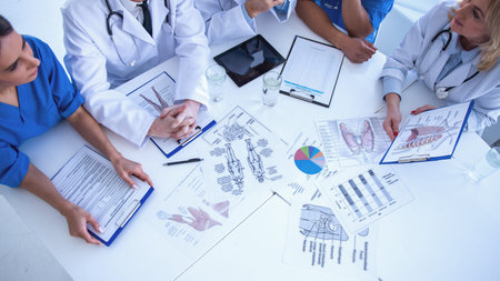 Cropped image of successful medical doctors discussing diagnosis during the conference