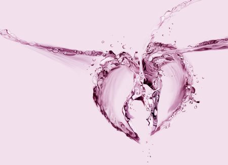 A broken heart made of red liquid splashing in two pieces.の写真素材