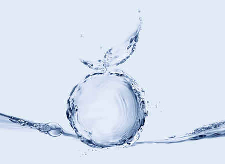 An orange made of water floating on water.の写真素材