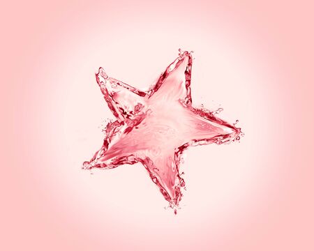 A red Christmas star made of water. の写真素材