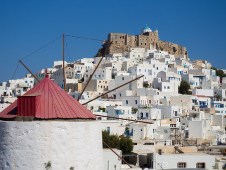 Chora of Astypapaia island ,Greece at daytime through a windmillの写真素材