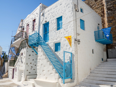 Astypalaia,Greece-22 August 2016.little flags hanging from the alleys for the celebrations of the Virgin Mairy .Astypalaia 22th 2016のeditorial素材