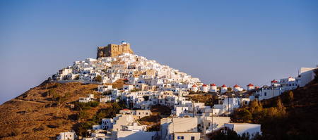 Chora of Astypapaia island ,Greece at daytime with the white houses that encircle the castleのeditorial素材