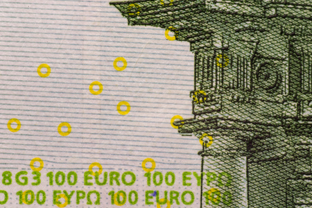 A closeup photo of a part of hundred euro billの写真素材