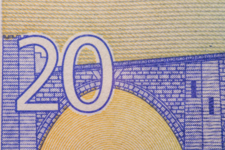 A closeup photo of a part of twenty euro bill