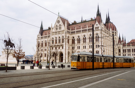 Budapest,Hungary March 2016. Front view of Parliament building and the yellow tram in Budapest,Hungaryのeditorial素材
