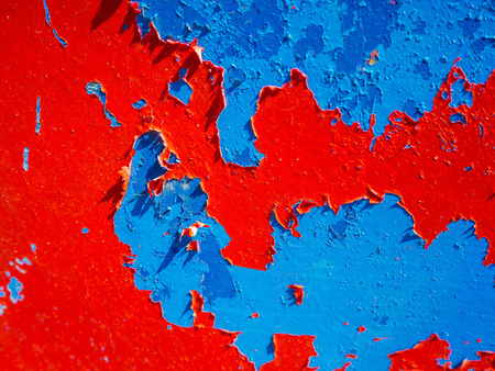 A close up to all the colors that had been painted on a small wooden boat on the beach of Amorgosの写真素材