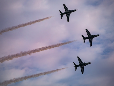Airplanes in formation during an airshowの写真素材