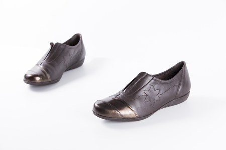 Female Brown Shoe on White Background, Isolated Product, Top View, Studio.の写真素材