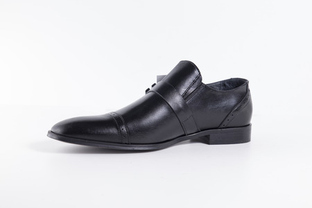 Beautiful elegance and luxury leather men shoes isolated on white backgroundの写真素材