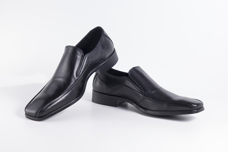 Beautiful elegance and luxury leather men shoes isolated on white backgroundの写真素材
