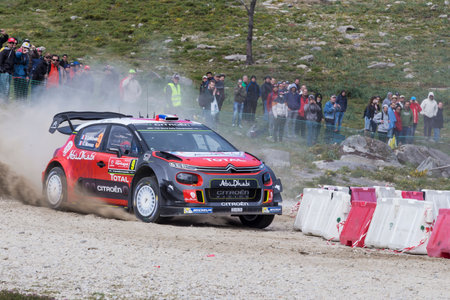 Craig Breen of Ireland and Scott Martin of Great Britain compete in their Citroen Total Abu Dhabi WRT Citroen C3 WRC during Day Two of the WRC Portugal on May 18, 2018 in Caminha,のeditorial素材