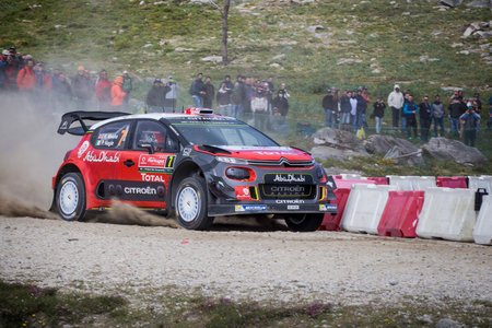 Craig Breen of Ireland and Scott Martin of Great Britain compete in their Citroen Total Abu Dhabi WRT Citroen C3 WRC during Day Two of the WRC Portugal on May 18, 2018 in Camaのeditorial素材
