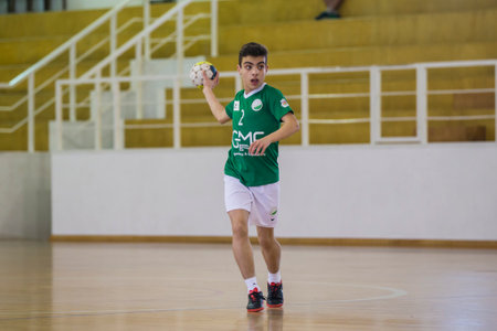 Viana do Castelo, Portugal - November 13, 2021: Afifense player in action against Vermoim, handball game counting for the Intantis Tournament.のeditorial素材
