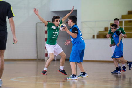 Viana do Castelo, Portugal - February 15, 2020: AD Afifense player in action against Becas B, game to count to the Minis Tournament organized by Afifense handball on February15, 2020 in Afife.のeditorial素材