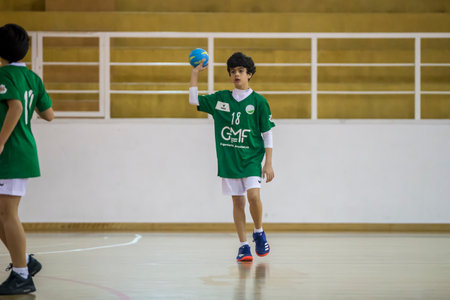 Afife, Viana do Castelo, Portugal - February 9, 2019: AD Afifense player in action against Vermoim, game to count to the Minis Tournament organized by Afifense handball on February 9, 2019 in Afife.のeditorial素材