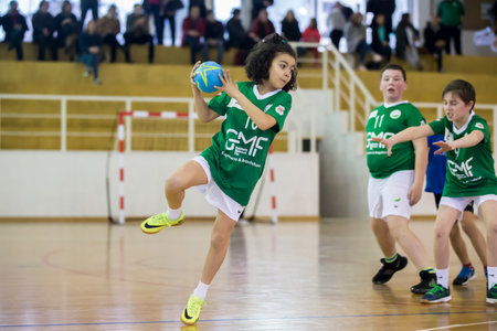 Afife, Viana do Castelo, Portugal - February 9, 2019: AD Afifense player in action against Vermoim, game to count to the Minis Tournament organized by Afifense handball on February 9, 2019 in Afife.のeditorial素材