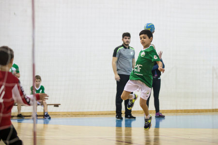 Afife, Viana do Castelo, Portugal - February 9, 2019: AD Afifense player in action against Vermoim, game to count to the Minis Tournament organized by Afifense handball on February 9, 2019 in Afife.のeditorial素材