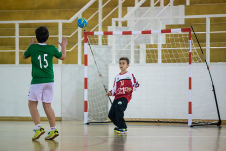 Afife, Viana do Castelo, Portugal - February 1, 2020: AD Afifense player in action against Becas B, game to count to the Minis Tournament organized by Afifense handball on February 1, 2020 in Afife.のeditorial素材