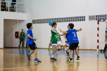 Afife, Viana do Castelo, Portugal - February 9, 2019: AD Afifense player in action against Vermoim, game to count to the Minis Tournament organized by Afifense handball on February 9, 2019 in Afife.のeditorial素材
