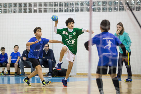 Afife, Viana do Castelo, Portugal - February 9, 2019: AD Afifense player in action against Vermoim, game to count to the Minis Tournament organized by Afifense handball on February 9, 2019 in Afife.のeditorial素材