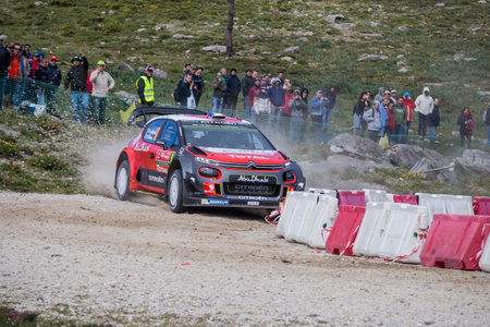 Craig Breen of Ireland and Scott Martin of Great Britain compete in their Citroen Total Abu Dhabi WRT Citroen C3 WRC during Day Two of the WRC Portugal on May 18, 2018 in Caminha, Portugal.のeditorial素材