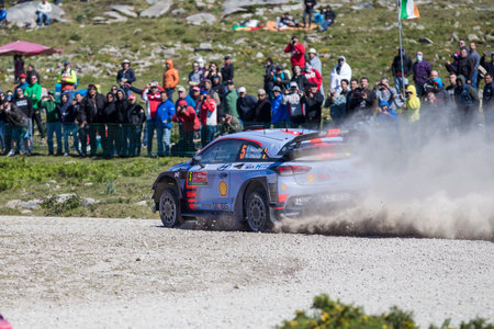 New Zealand driver Hayden Paddon and English co-driver Sebastian Marshall competes with their Hyunday I20 Coupe WRC during the third stage of the Rally of Portugal near Vieira do Minho.のeditorial素材