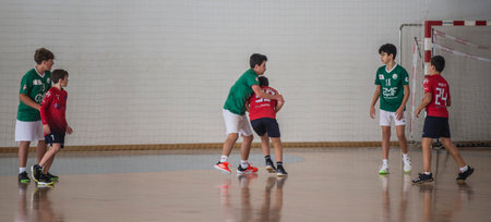 Afife, Viana do Castelo, Portugal - November 13, 2021: AD Afifense player in action against Vermoim, game counting for the Intantis Tournament organized by Afifense in handball on February 13, 2021のeditorial素材